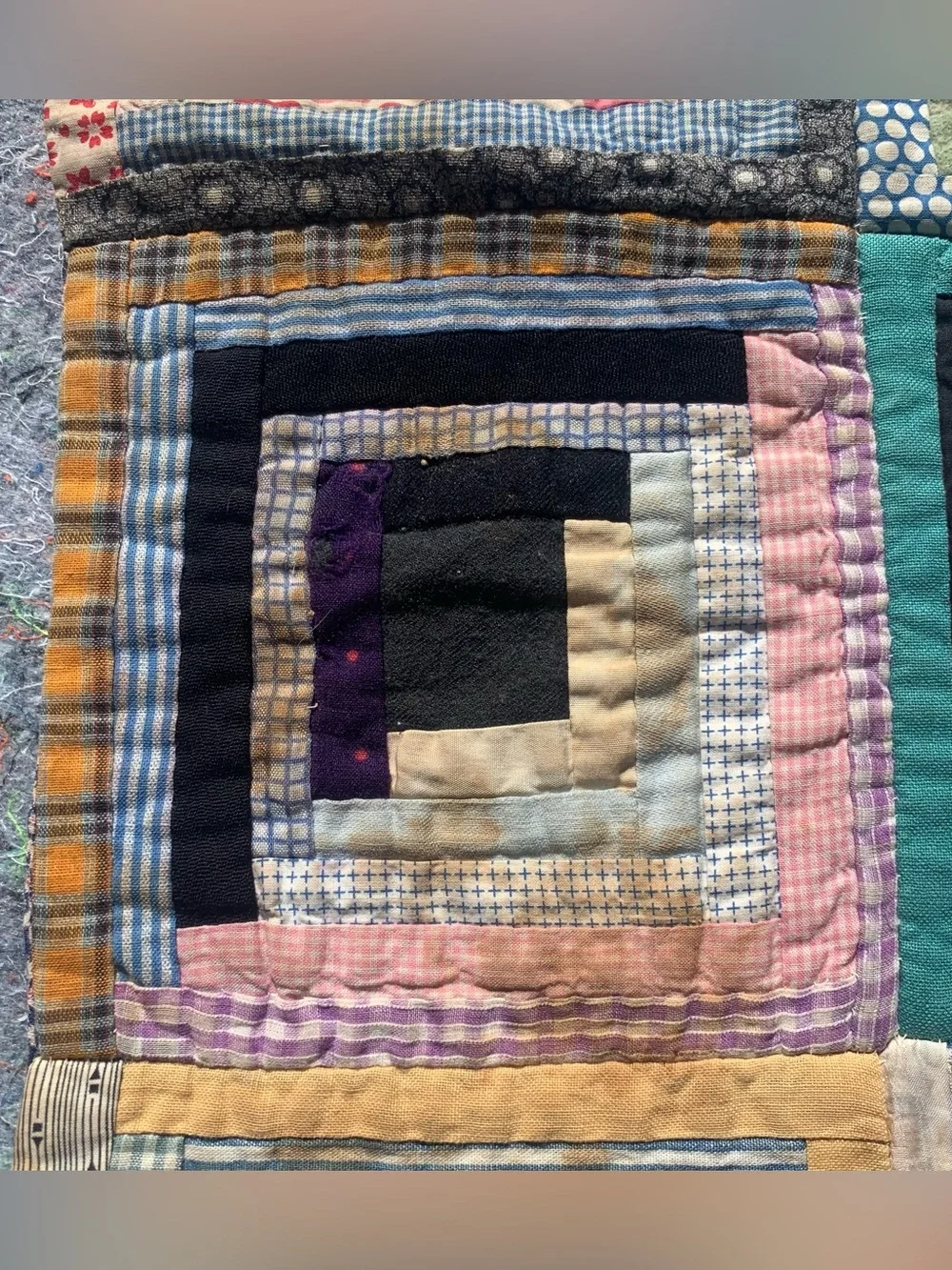 Antique 1940s or older multicolor multi-material log cabin quilt